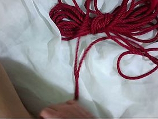 The girl was stripped and tied up during a studio shoot. POV